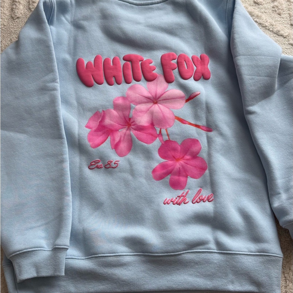 White Fox Boutique Light Blue Crewneck with Pink Floral Graphic